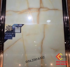 Gạch lát nền khắc kim 60x120 vân đá nâu tự nhiên