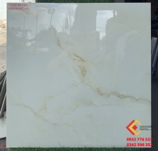Gạch trang trí 60x60 màu trắng vân vàng bóng kiếng tại Kiên Giang