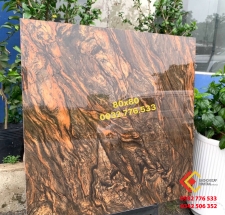 Gạch 80x80 vân đá màu nâu ốp tường nhà mẫu mới giá rẻ bền đẹp